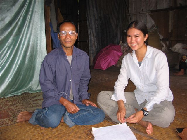 Young Emelie in Laos with Hose