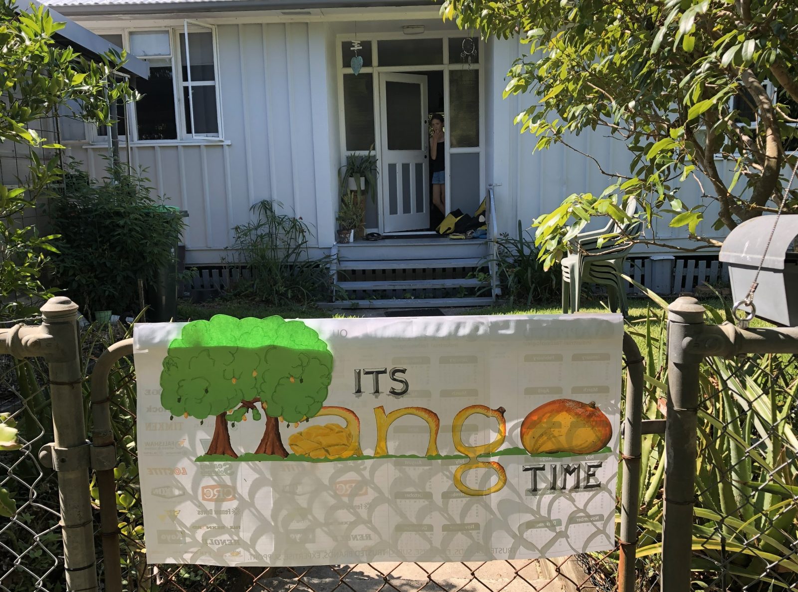 Photo of front gate with hand made sign